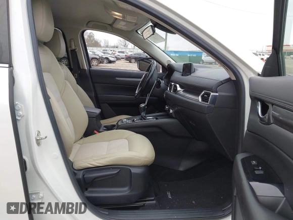 2017 Mazda CX-5 Touring with VIN JM3KFACL8H0205717, listed as a IAAI auction lot 41173725 with 107,604 mi miles. Bid and sale history available at carsss.com. Image 5.