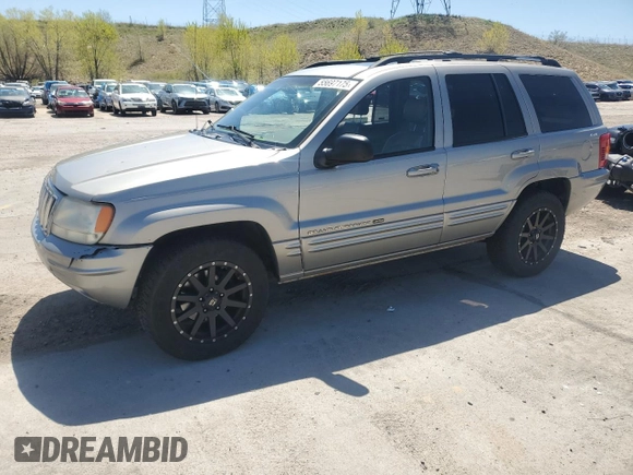 2001 Jeep Grand Cherokee Limited with VIN 1J4GW58N11C568908, listed as a Copart auction lot 55697175 with 214,491 mi miles and Clean Title. Bid and sale history available at DreamBid. Image 1.