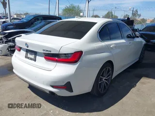 2019 BMW 3 Series 330i xDrive with VIN WBA5R7C54KAJ79701, listed as a IAAI auction lot 41871962 with 70,479 mi miles. Bid and sale history available at carsss.com. Image 4.