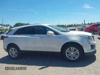 2021 Cadillac XT5 FWD Luxury with VIN 1GYKNAR48MZ149757, listed as a IAAI auction lot 41851510 with 37,607 mi miles. Bid and sale history available at carsss.com. Image 14.