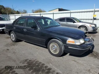 2001 Ford Crown Victoria Police Police Interceptor with VIN 2FAFP71W41X205475, listed as a Copart auction lot 75265194 with 117,633 mi miles and Salvage Title. Bid and sale history available at carsss.com. Image 4.
