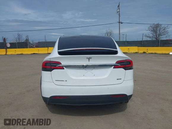 2016 Tesla Model X 70D with VIN 5YJXCBE24GF002020, listed as a IAAI auction lot 41799528 with 149,556 mi miles. Bid and sale history available at carsss.com. Image 16.