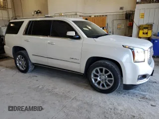 2015 GMC Yukon Denali with VIN 1GKS2CKJ7FR266750, listed as a Copart auction lot 47882125 with 121,705 mi miles and Salvage Title. Bid and sale history available at carsss.com. Image 4.