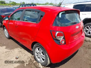 2012 Chevrolet Sonic LT with VIN 1G1JC6SHXC4147031, listed as a IAAI auction lot 42343093 with 165,386 mi miles and . Bid and sale history available at DreamBid. Image 3.
