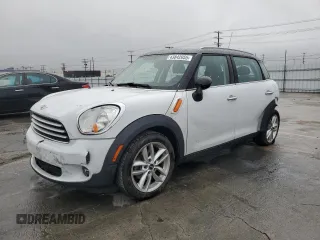 2013 MINI Countryman with VIN WMWZB3C56DWM07475, listed as a Copart auction lot 43842055 with 95,003 mi miles and Salvage title. Bid and sale history available at DreamBid. Image 1.