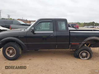 2003 Ford Ranger XL with VIN 1FTYR14U43PB67839, listed as a IAAI auction lot 41950004 with 130,164 mi miles. Bid and sale history available at carsss.com. Image 14.