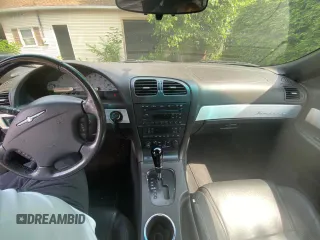 2002 Ford Thunderbird Hardtop Premium с VIN 1FAHP60A32Y114563, выставлен на аукционе Copart как лот 61160805 с пробегом 147 234 миль миль и Чистый • Clean title. История ставок и продаж доступна на DreamBid. Изображение 9.