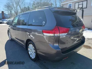 2014 Toyota Sienna LE with VIN 5TDJK3DC4ES074014, listed as a Copart auction lot 48602075 with 284,647 mi miles and Clean Title. Bid and sale history available at DreamBid. Image 3.