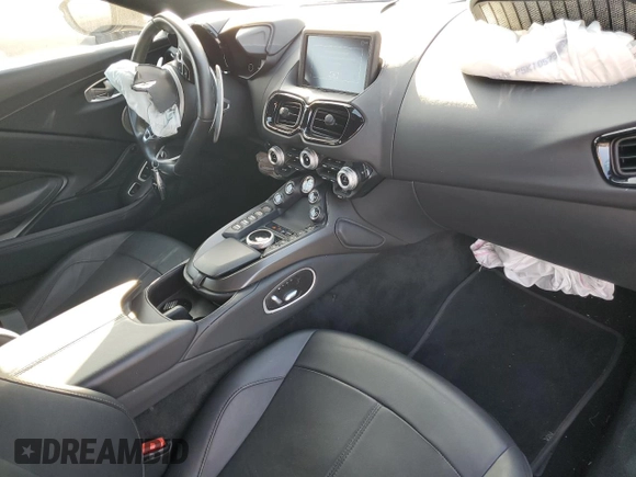 2023 Aston Martin Vantage z VIN SCFSMGBW8PGP07034, wystawiony jako Copart lot #83069914 z przebiegiem Nie podano mil oraz Szkody całkowita. Historia ofert i sprzedaży dostępna na DreamBid. Obrazek 8.
