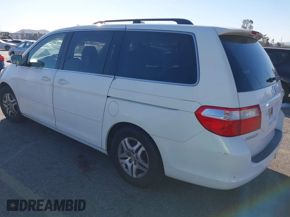 2006 Honda Odyssey EX z VIN 5FNRL38486B410286, wystawiony jako IAAI lot #41641433 z przebiegiem 145 312 mil mil oraz . Historia ofert i sprzedaży dostępna na DreamBid. Obrazek 3.