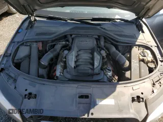 2012 Audi A8 z VIN WAURVAFDXCN001167, wystawiony jako Copart lot #57227105 z przebiegiem 154 409 mil mil oraz Szkoda całkowita • Salvage title. Historia ofert i sprzedaży dostępna na DreamBid. Obrazek 11.