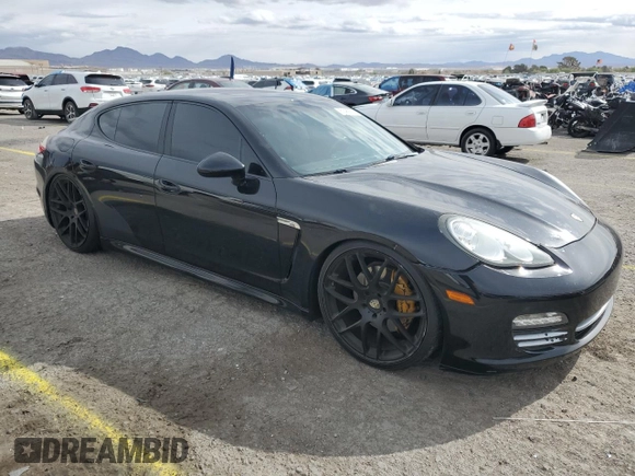 2011 Porsche Panamera with VIN WP0AA2A7XBL014899, listed as a Copart auction lot 51489215 with 112,585 mi miles and Salvage title. Bid and sale history available at DreamBid. Image 4.