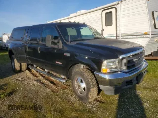 2003 Ford F-350 XL with VIN 1FTWW33P63EB35350, listed as a Copart auction lot 44865495 with 169,124 mi miles and Salvage Title. Bid and sale history available at DreamBid. Image 4.