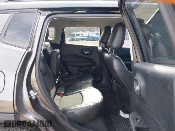 2019 Jeep Compass Latitude with VIN 3C4NJDBB4KT593022, listed as a IAAI auction lot 41627841 with 69,443 mi miles and . Bid and sale history available at DreamBid. Image 8.