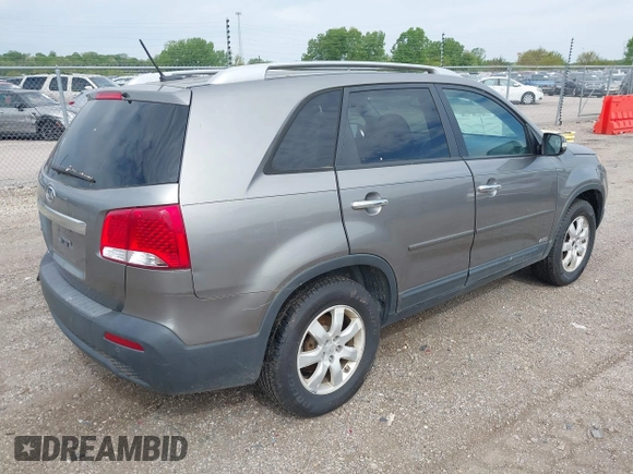 2011 Kia Sorento LX with VIN 5XYKTDA14BG141553, listed as a IAAI auction lot 42190896 with 212,690 mi miles and . Bid and sale history available at carsss.com. Image 4.