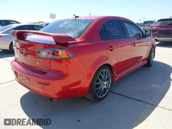 2015 Mitsubishi Lancer GT with VIN JA32U8FW9FU014308, listed as a IAAI auction lot 41982416 with 227,574 mi miles. Bid and sale history available at carsss.com. Image 4.