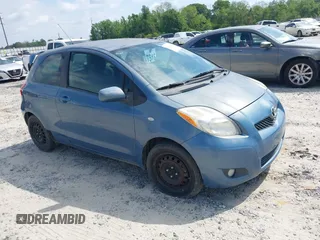 2009 Toyota Yaris with VIN JTDJT903X95227092, listed as a IAAI auction lot 42018166 with 120,605 mi miles. Bid and sale history available at carsss.com. Image 1.