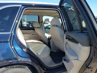 2016 BMW X5 sDrive35i with VIN 5UXKR2C55G0R71330, listed as a IAAI auction lot 41661140 with 128,457 mi miles. Bid and sale history available at carsss.com. Image 8.