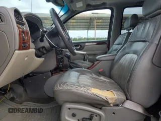 2003 GMC Envoy SLE z VIN 1GKDS13S632143174, wystawiony jako Copart lot #81514914 z przebiegiem Nie podano mil oraz Szkoda całkowita • Salvage title. Historia ofert i sprzedaży dostępna na DreamBid. Obrazek 7.