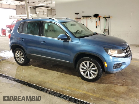 2017 Volkswagen Tiguan Wolfsburg Edition with VIN WVGSV7AX1HK014774, listed as a Copart auction lot 64456925 with 91,999 mi miles and Salvage title. Bid and sale history available at DreamBid. Image 4.