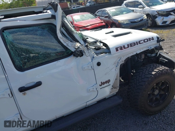 2022 Jeep Wrangler Unlimited Rubicon with VIN 1C4HJXFG8NW130156, listed as a IAAI auction lot 42004630 with 129,313 mi miles and . Bid and sale history available at DreamBid. Image 18.
