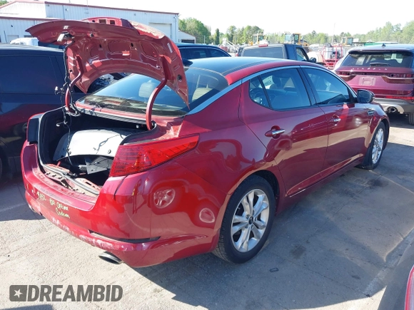 2011 Kia Optima EX with VIN KNAGN4A74B5076875, listed as a IAAI auction lot 42009937 with 190,484 mi miles and . Bid and sale history available at carsss.com. Image 4.