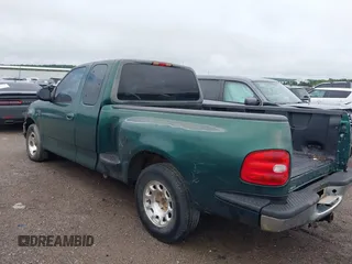 1999 Ford F-150 with VIN 1FTRX07W3XKB82854, listed as a IAAI auction lot 42411358 with Not provided miles and . Bid and sale history available at DreamBid. Image 3.