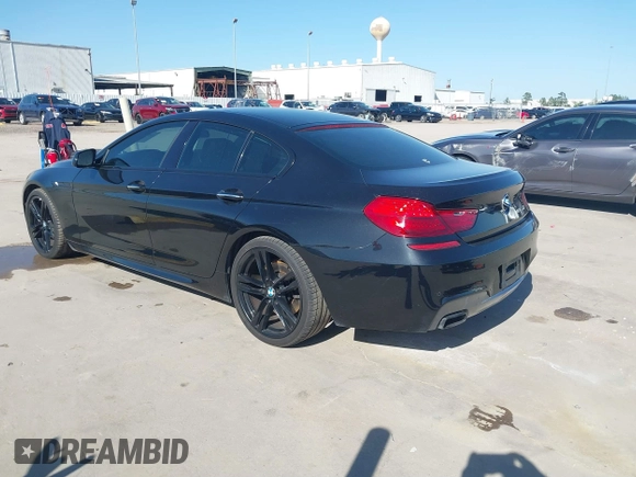 2014 BMW 6 Series 650i z VIN WBA6B2C55ED129419, wystawiony jako IAAI lot #39061341 z przebiegiem 68 790 mil mil oraz . Historia ofert i sprzedaży dostępna na DreamBid. Obrazek 3.