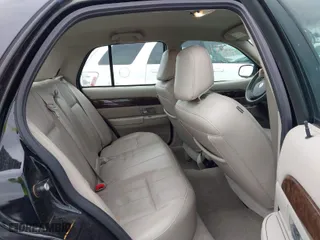 2010 Mercury Grand Marquis LS with VIN 2MEBM7FV5AX631935, listed as a IAAI auction lot 41726717 with 124,139 mi miles. Bid and sale history available at carsss.com. Image 8.