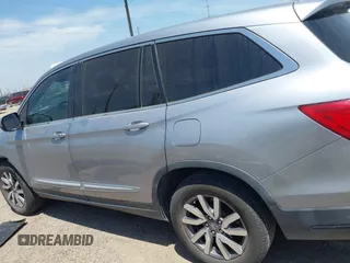 2020 Honda Pilot EX-L z VIN 5FNYF5H52LB007696, wystawiony jako IAAI lot #42065587 z przebiegiem 74 781 mil mil oraz . Historia ofert i sprzedaży dostępna na DreamBid. Obrazek 15.