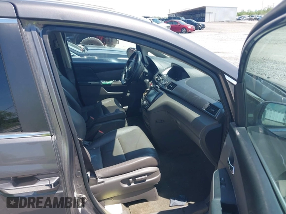 2014 Honda Odyssey EX-L with VIN 5FNRL5H6XEB111412, listed as a IAAI auction lot 41917361 with 210,841 mi miles and . Bid and sale history available at carsss.com. Image 5.