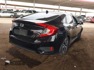 2017 Honda Civic Sedan EX-T with VIN 19XFC1F39HE028956, listed as a IAAI auction lot 41778460 with 57,216 mi miles. Bid and sale history available at carsss.com. Image 4.