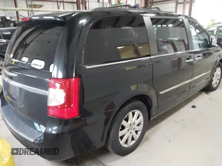 2012 Chrysler Town & Country Touring L with VIN 2C4RC1CGXCR170910, listed as a IAAI auction lot 41911179 with 167,850 mi miles and . Bid and sale history available at carsss.com. Image 4.