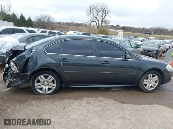2014 Chevrolet Impala LT with VIN 2G1WB5E35E1123415, listed as a IAAI auction lot 41101111 with 129,870 mi miles and . Bid and sale history available at DreamBid. Image 13.