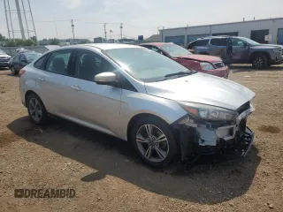 2017 Ford Focus SE with VIN 1FADP3FE7HL290271, listed as a Copart auction lot 60665615 with 130,409 mi miles and Salvage title. Bid and sale history available at DreamBid. Image 4.