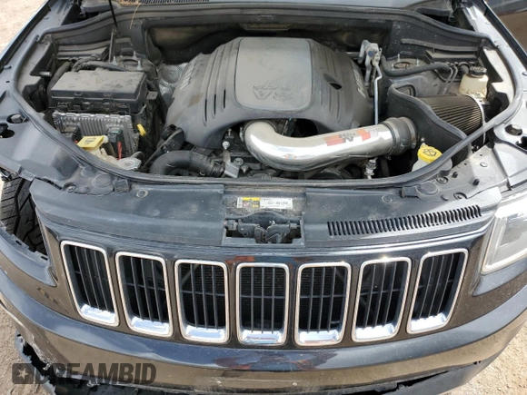 2014 Jeep Grand Cherokee Limited z VIN 1C4RJFBT6EC184557, wystawiony jako Copart lot #57657095 z przebiegiem 157 688 mil mil oraz Szkoda całkowita • Salvage title. Historia ofert i sprzedaży dostępna na DreamBid. Obrazek 12.