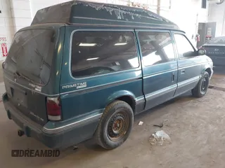 1995 Dodge Caravan Grand SE with VIN 1B4GH44R3SX566801, listed as a IAAI auction lot 42699597 with 103,069 mi miles and . Bid and sale history available at DreamBid. Image 4.
