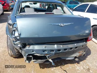 2005 Chrysler 300 with VIN 2C3AA53G35H157083, listed as a IAAI auction lot 41945392 with 192,215 mi miles. Bid and sale history available at carsss.com. Image 6.