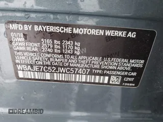 2018 BMW 5 Series 540i xDrive with VIN WBAJE7C52JWC57407, listed as a IAAI auction lot 41805890 with 112,151 mi miles and . Bid and sale history available at DreamBid. Image 9.