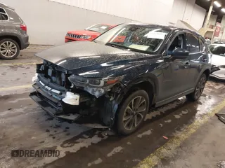 2023 Mazda CX-5 2.5 S Premium Plus Package with VIN JM3KFBEM0P0157074, listed as a IAAI auction lot 41215076 with 37,323 mi miles. Bid and sale history available at carsss.com. Image 18.