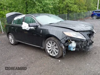 2015 Lincoln MKS z VIN 1LNHL9DKXFG603785, wystawiony jako IAAI lot #42318110 z przebiegiem 110 522 mil mil oraz . Historia ofert i sprzedaży dostępna na DreamBid. Obrazek 1.