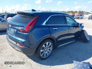 2020 Cadillac XT4 FWD Premium Luxury with VIN 1GYFZCR40LF085229, listed as a IAAI auction lot 41688726 with 19,739 mi miles. Bid and sale history available at carsss.com. Image 4.