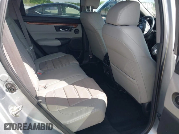 2018 Honda CR-V Touring with VIN 7FARW1H90JE012526, listed as a IAAI auction lot 42055078 with 96,098 mi miles and . Bid and sale history available at DreamBid. Image 8.