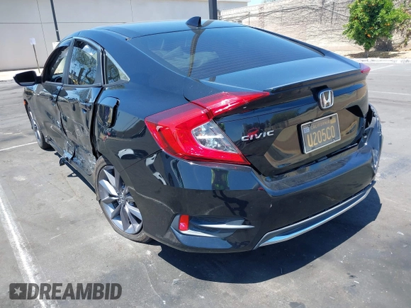 2019 Honda Civic EX z VIN 19XFC1F3XKE215534, wystawiony jako IAAI lot #42100714 z przebiegiem 31 808 mil mil oraz . Historia ofert i sprzedaży dostępna na DreamBid. Obrazek 3.