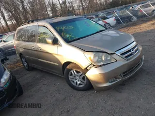 2007 Honda Odyssey EX-L with VIN 5FNRL38717B404759, listed as a IAAI auction lot 41794740 with Not Provided miles and . Bid and sale history available at DreamBid. Image 1.