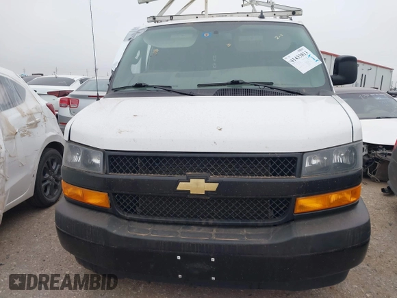 2023 Chevrolet Express Cargo z VIN 1GCWGAFP0P1104007, wystawiony jako IAAI lot #41433813 z przebiegiem 80 352 mil mil oraz . Historia ofert i sprzedaży dostępna na DreamBid. Obrazek 12.