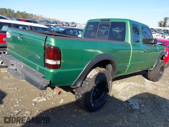 1999 Ford Ranger XLT with VIN 1FTZR15X3XPA13058, listed as a IAAI auction lot 41329263 with 96,926 mi miles and . Bid and sale history available at DreamBid. Image 4.