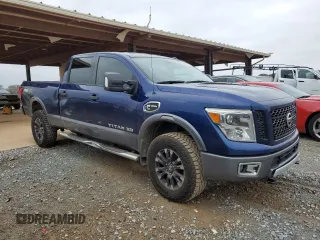 2017 Nissan Titan XD PRO-4X with VIN 1N6BA1F46HN519362, listed as a Copart auction lot 82225564 with 110,349 mi miles and Salvage Title. Bid and sale history available at carsss.com. Image 4.