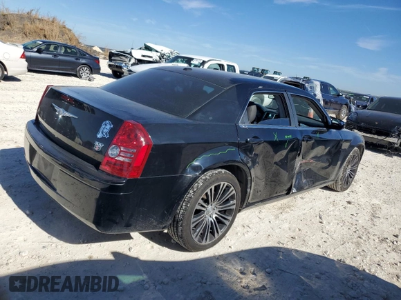 2010 Chrysler 300 with VIN 2C3CA2CV0AH279836, listed as a Copart auction lot 81843694 with 128,515 mi miles and Salvage Title. Bid and sale history available at carsss.com. Image 3.