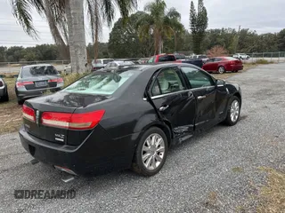 2011 Lincoln MKZ Hybrid with VIN 3LNDL2L33BR759329, listed as a Copart auction lot 42415245 with 131,927 mi miles and Clean Title. Bid and sale history available at carsss.com. Image 4.
